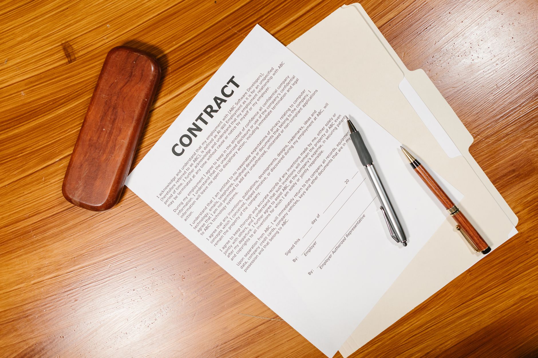 Corporate legal briefing documents with pen